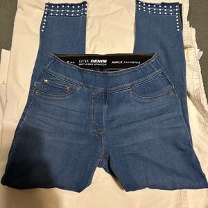 Luxe Denim 4 way stretch ankle jeans with little white beads around ankles.